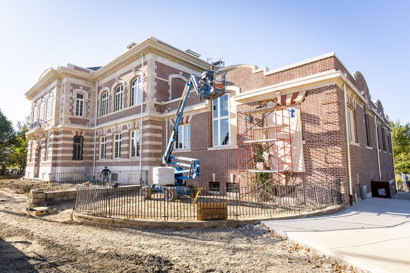 Masonry repair and repointing in progress, northeast corner