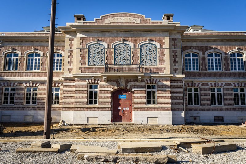 Main entry — GFRC cornice, new balcony and metal railing