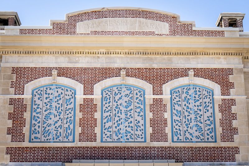 Restored pediment and decorative window screens at Kingsessing Recreation Center