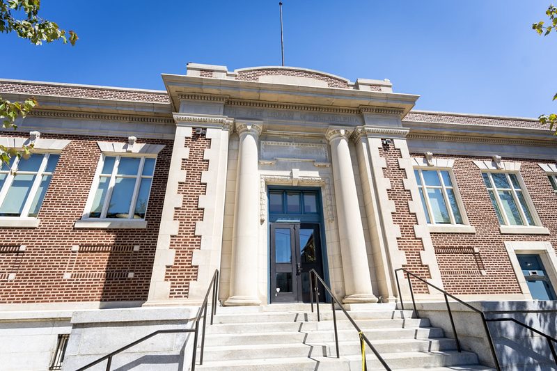 Entrance — restored masonry, columns and new exterior doors